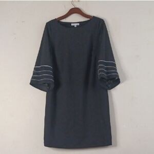 Elegant Black Dress with Striped Sleeves